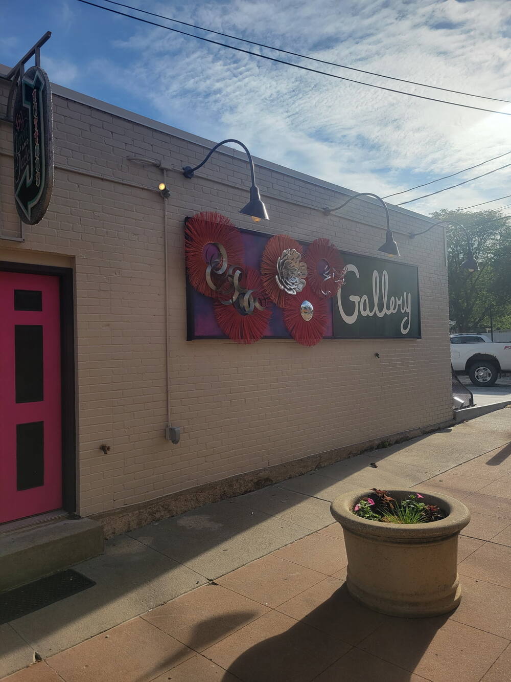 Gallery storefront sign on a brick building in Lincoln, NE